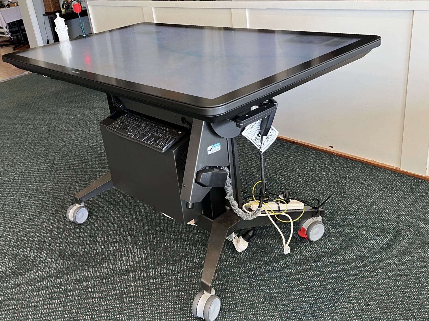 Powered height adjustable cart